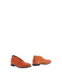 Полусапоги и высокие ботинки RAF Simons