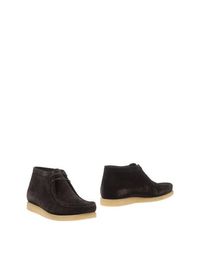 Полусапоги и высокие ботинки Sebago