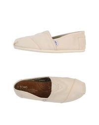 Низкие кеды и кроссовки Toms