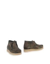 Полусапоги и высокие ботинки Sebago