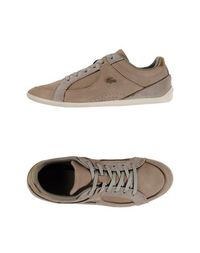 Низкие кеды и кроссовки Lacoste