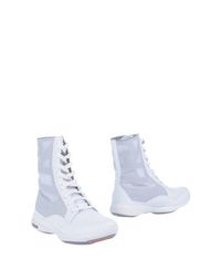 Белые Полусапоги и высокие ботинки Emporio Armani Reebok