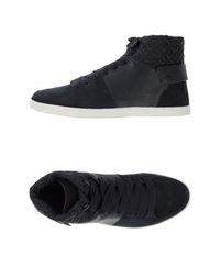 Высокие кеды и кроссовки Lacoste