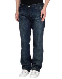Джинсовые брюки Wrangler