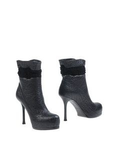 Черные Полусапоги и высокие ботинки Yves Saint Laurent Rive Gauche