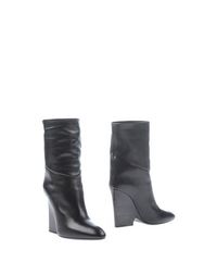 Черные Полусапоги и высокие ботинки Jimmy Choo London