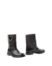 Полусапоги и высокие ботинки Casadei