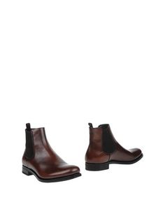 Полусапоги и высокие ботинки Prada