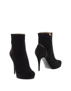 Черные Полусапоги и высокие ботинки Yves Saint Laurent Rive Gauche