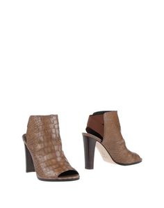 Полусапоги и высокие ботинки Stuart Weitzman