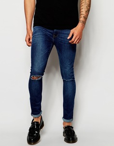 Ультразауженные джинсы скинни с рваными коленями ASOS - Синий