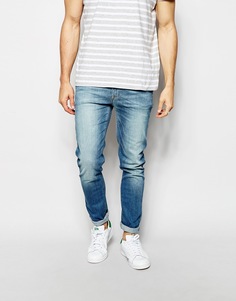 Зауженные джинсы с потертостями ASOS - Умеренный синий