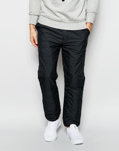 Стеганые суженные тренировочные брюки Levi's California - Серый