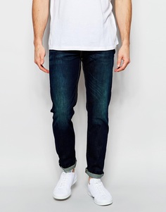 Суженные книзу темные джинсы с эффектом поношенности Levis 511 - Biology Levi's®