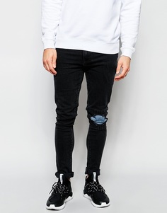 Черные выбеленные суперузкие джинсы с прорехами и нашивками ASOS - Выбеленный черный