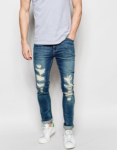 Рваные супероблегающие джинсы ASOS - Умеренный синий