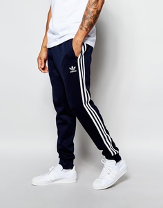 Спортивные штаны с кромкой манжетом adidas Originals Superstar AJ6961 - Синий