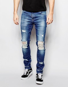 Супероблегающие джинсы с рваными коленями ASOS - Умеренный синий