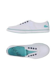 Низкие кеды и кроссовки Lacoste