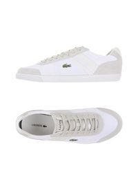 Низкие кеды и кроссовки Lacoste