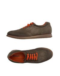 Низкие кеды и кроссовки Tricker's