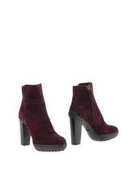 Полусапоги и высокие ботинки Tod's