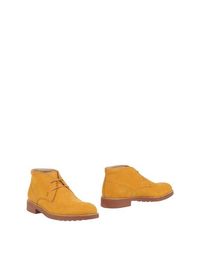 Полусапоги и высокие ботинки Tod's