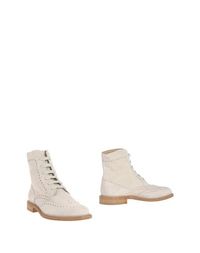 Полусапоги и высокие ботинки Tod's