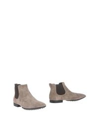 Полусапоги и высокие ботинки Tod's