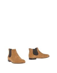 Полусапоги и высокие ботинки Tod's