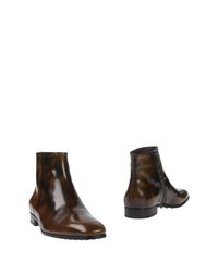Полусапоги и высокие ботинки Tod's