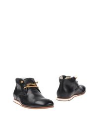 Полусапоги и высокие ботинки Tod's