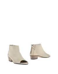 Бежевые Полусапоги и высокие ботинки Onid Studio