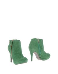 Зеленые Полусапоги и высокие ботинки XTI