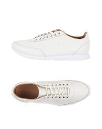 Низкие кеды и кроссовки Lacoste