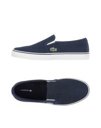 Низкие кеды и кроссовки Lacoste