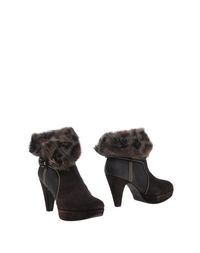 Коричневые Полусапоги и высокие ботинки Stuart Weitzman