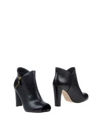 Черные Полусапоги и высокие ботинки Stuart Weitzman