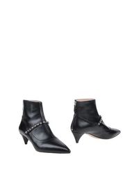 Черные Полусапоги и высокие ботинки MIU MIU