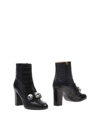 Черные Полусапоги и высокие ботинки Moschino Cheapandchic