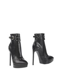 Черные Полусапоги и высокие ботинки Saint Laurent