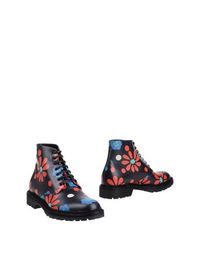 Черные Полусапоги и высокие ботинки Saint Laurent