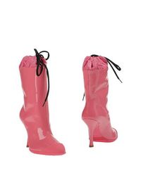 Полусапоги и высокие ботинки MIU MIU