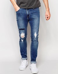 Синие выбеленные суженные джинсы слим с прорехами Dr Denim