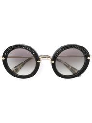 солнцезащитные очки в круглой оправе Miu Miu