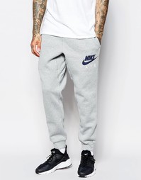 Серые спортивные брюки зауженного кроя Nike AW77 727369-063 - Серый