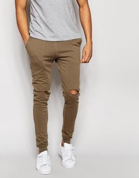 Супероблегающие спортивные штаны с дырками на коленях ASOS