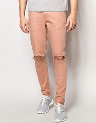 Розовые супероблегающие джинсы с рваными коленками ASOS