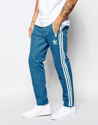 Синие спортивные штаны в ломаную полоску adidas Originals AZ3271