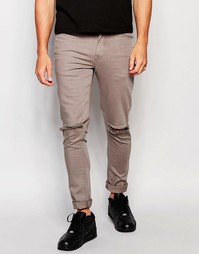 Супероблегающие серые джинсы с рваными коленями ASOS - Серый